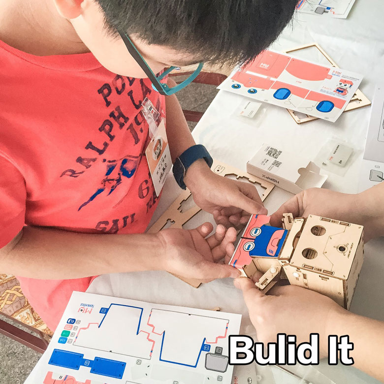 DIY Interactive Robot Building Kit with Face Detection and Visual Programmable Interface